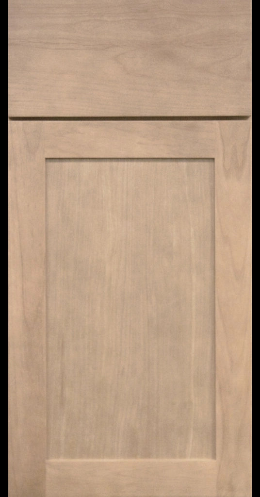 Medium Stain Finish on shaker cabinet door with matching Slab Drawer Front.