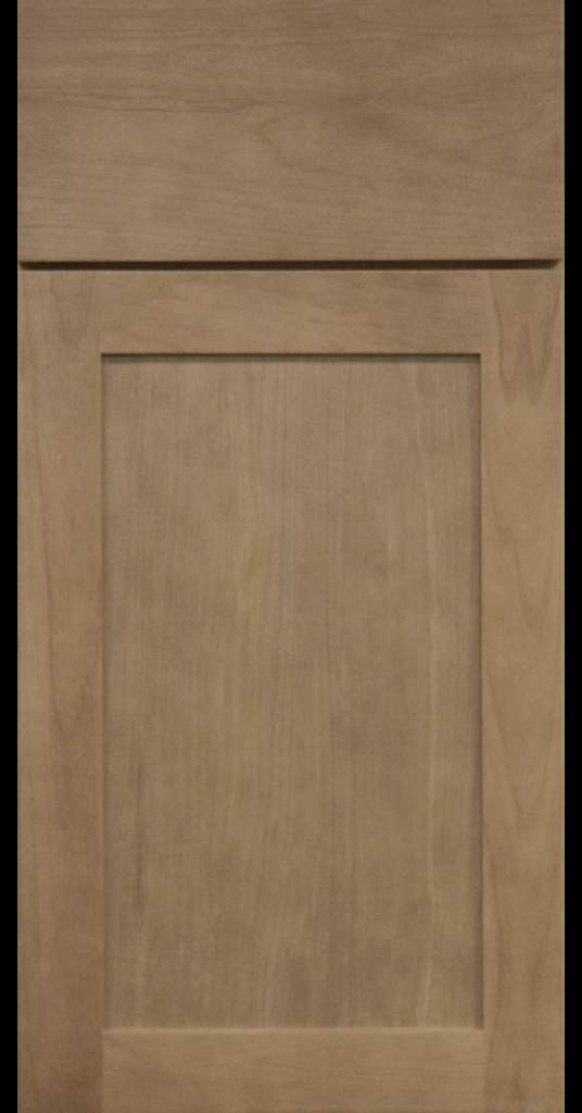 Medium Dark Stain Finish on shaker cabinet door with matching Slab Drawer Front.